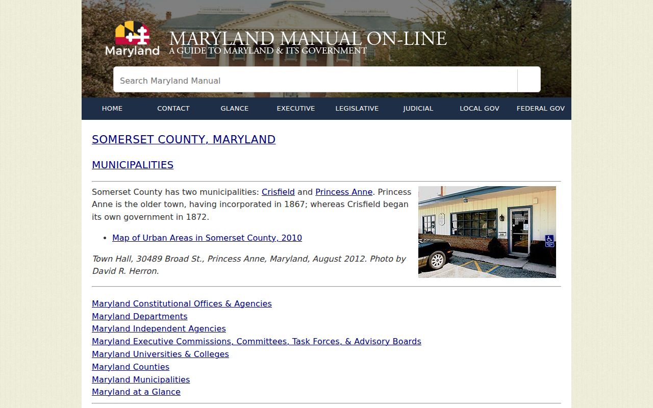 Somerset County municipal court warrant lookup showing the Maryland Manual municipality page and town hall